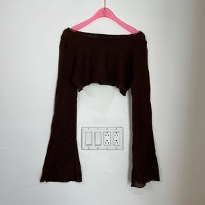 Deep brown sweater arms